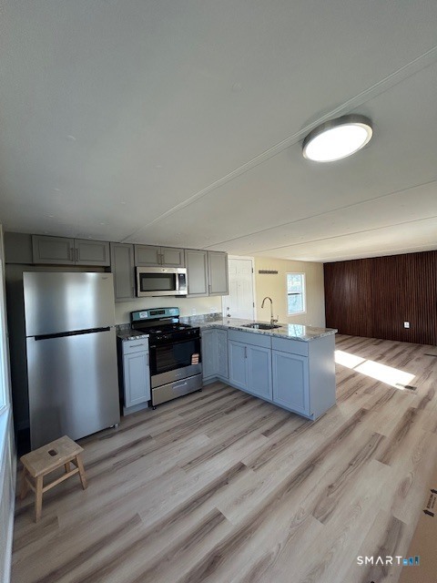 18 Fairway Drive Windham, CT 06256 - Photo 5 of 15 a kitchen with stainless steel appliances a refrigerator and a stove
