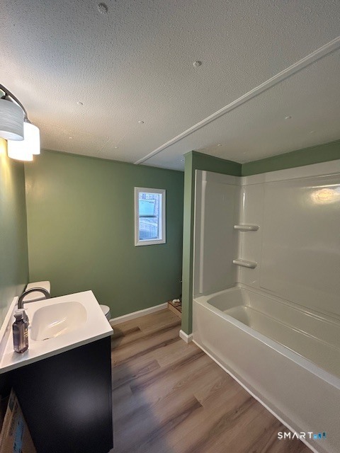 18 Fairway Drive Windham, CT 06256 - Photo 7 of 15 a bathroom with a sink a toilet and shower