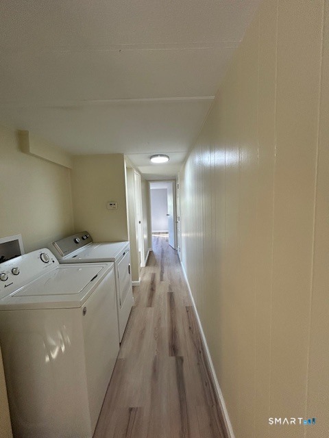 18 Fairway Drive Windham, CT 06256 - Photo 9 of 15 a view of hallway with washer and dryer