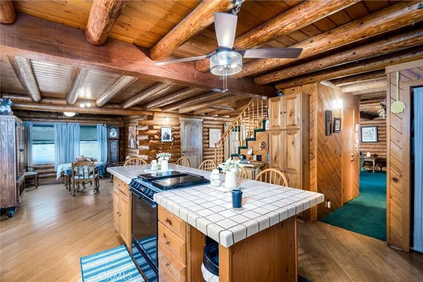 a very nice looking dining room with a table and chairs
