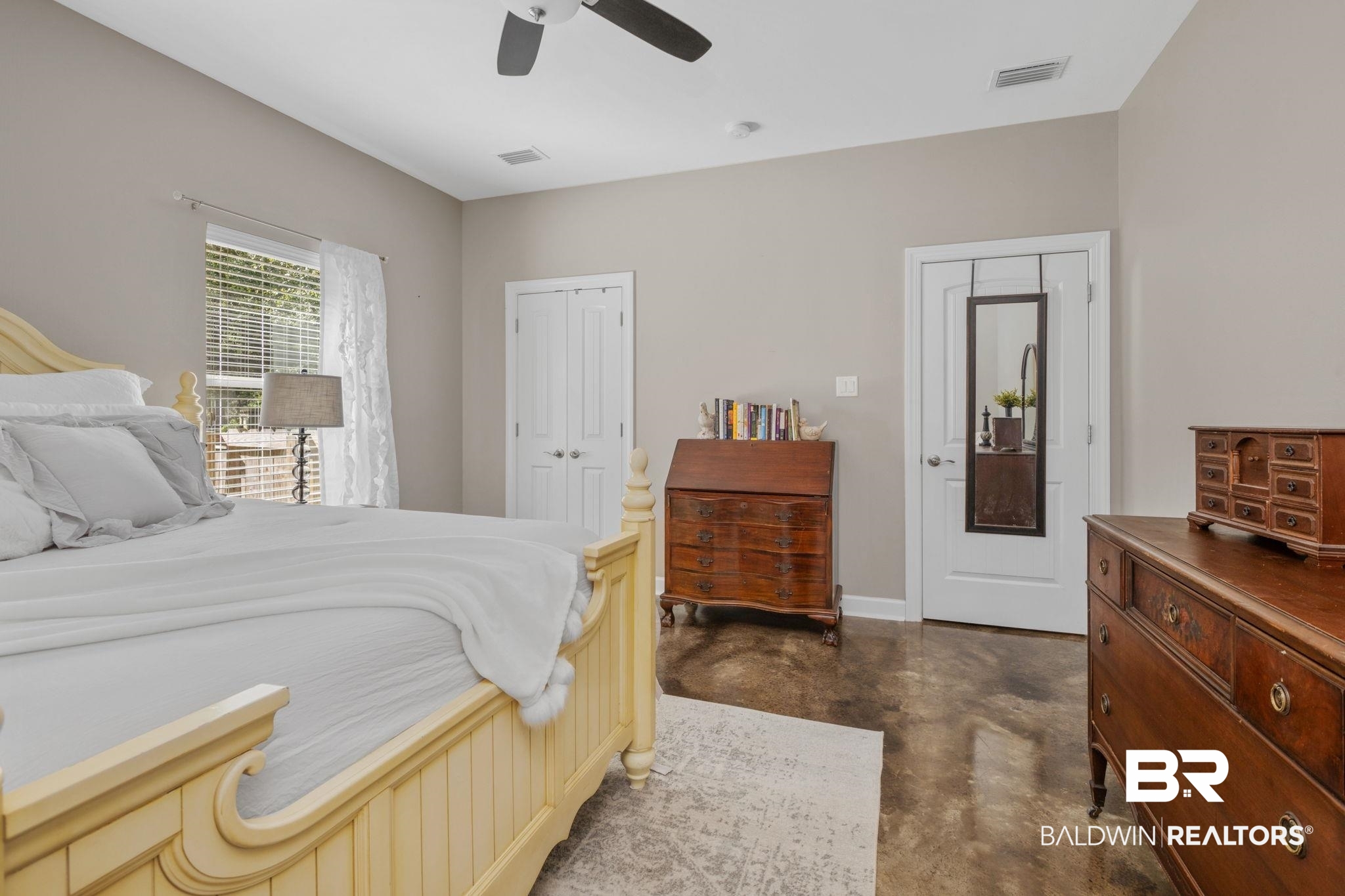 4331 Hamilton Oaks Lane Mobile, AL 36695 - Photo 13 of 38 Bedroom with concrete flooring, a closet, ceiling fan, and baseboards