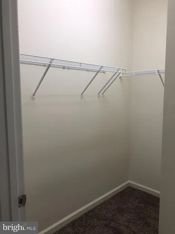 a view of small space with racks on the wall