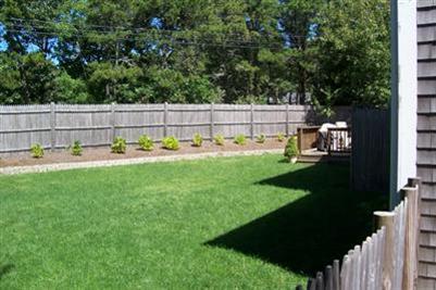 9 Shady Lane Chatham, MA 02633 - Photo 15 of 19 a view of a backyard with sitting area