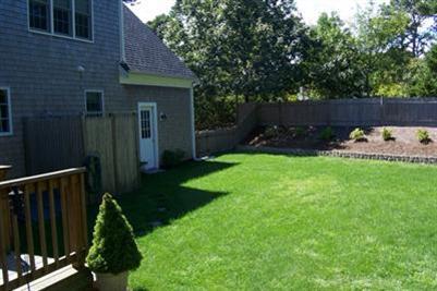 9 Shady Lane Chatham, MA 02633 - Photo 16 of 19 a view of backyard with wooden fence