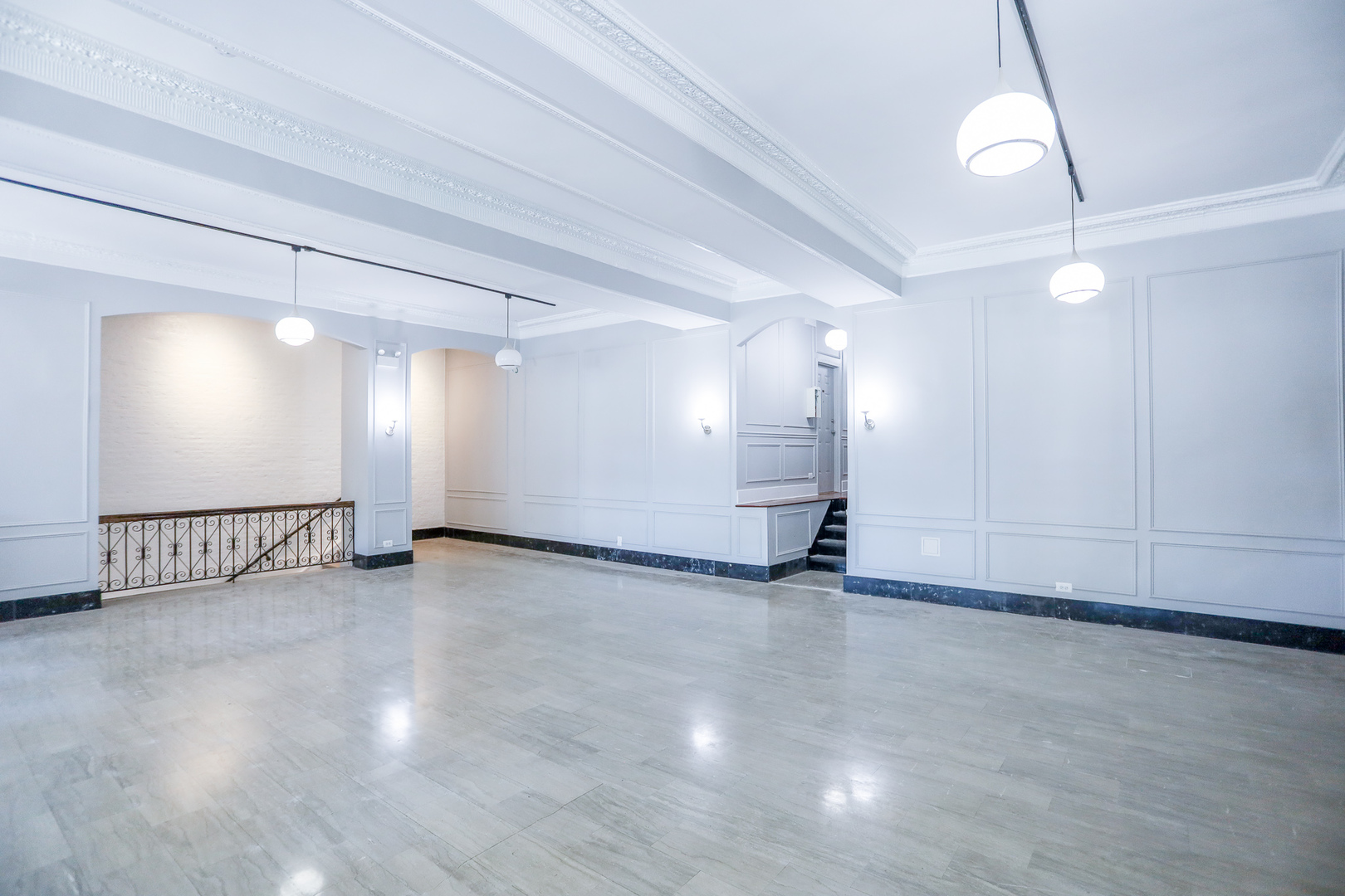 4526 North Sheridan Road, Unit 303 Chicago, IL 60640 - Photo 8 of 14 an empty room with wooden floor fan and windows