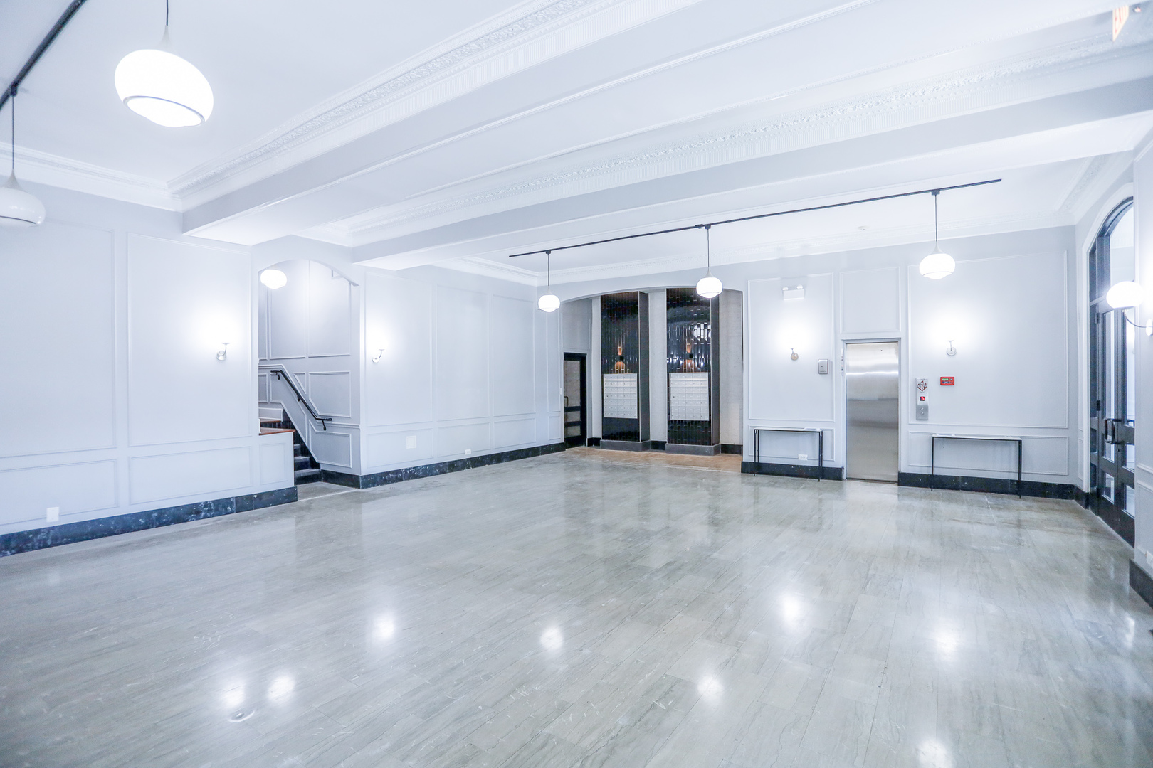 4526 North Sheridan Road, Unit 303 Chicago, IL 60640 - Photo 9 of 14 a view of empty room with wooden floor