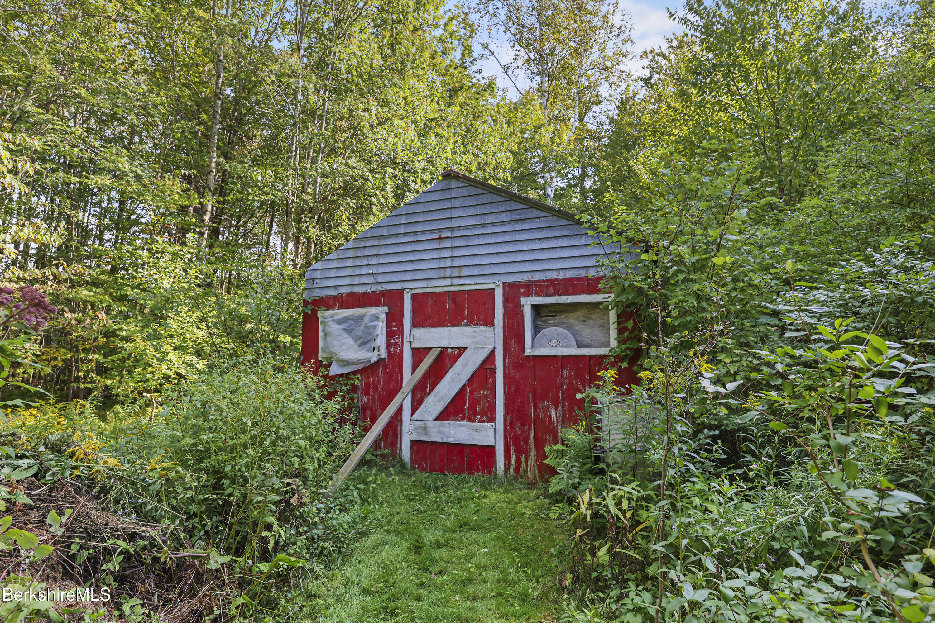 78 East Main Road Peru, MA 01235 - Photo 50 of 56 a backyard of a house with lots of green space
