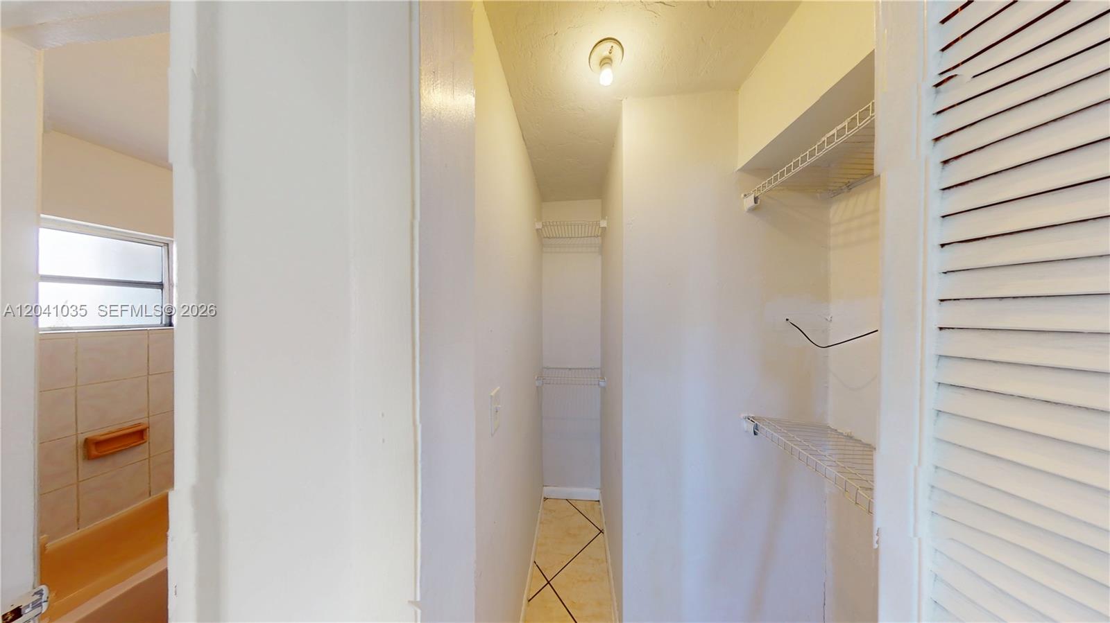 6811 Southwest 16th Street Miami, FL 33144 - Photo 10 of 21 a bathroom with a shower