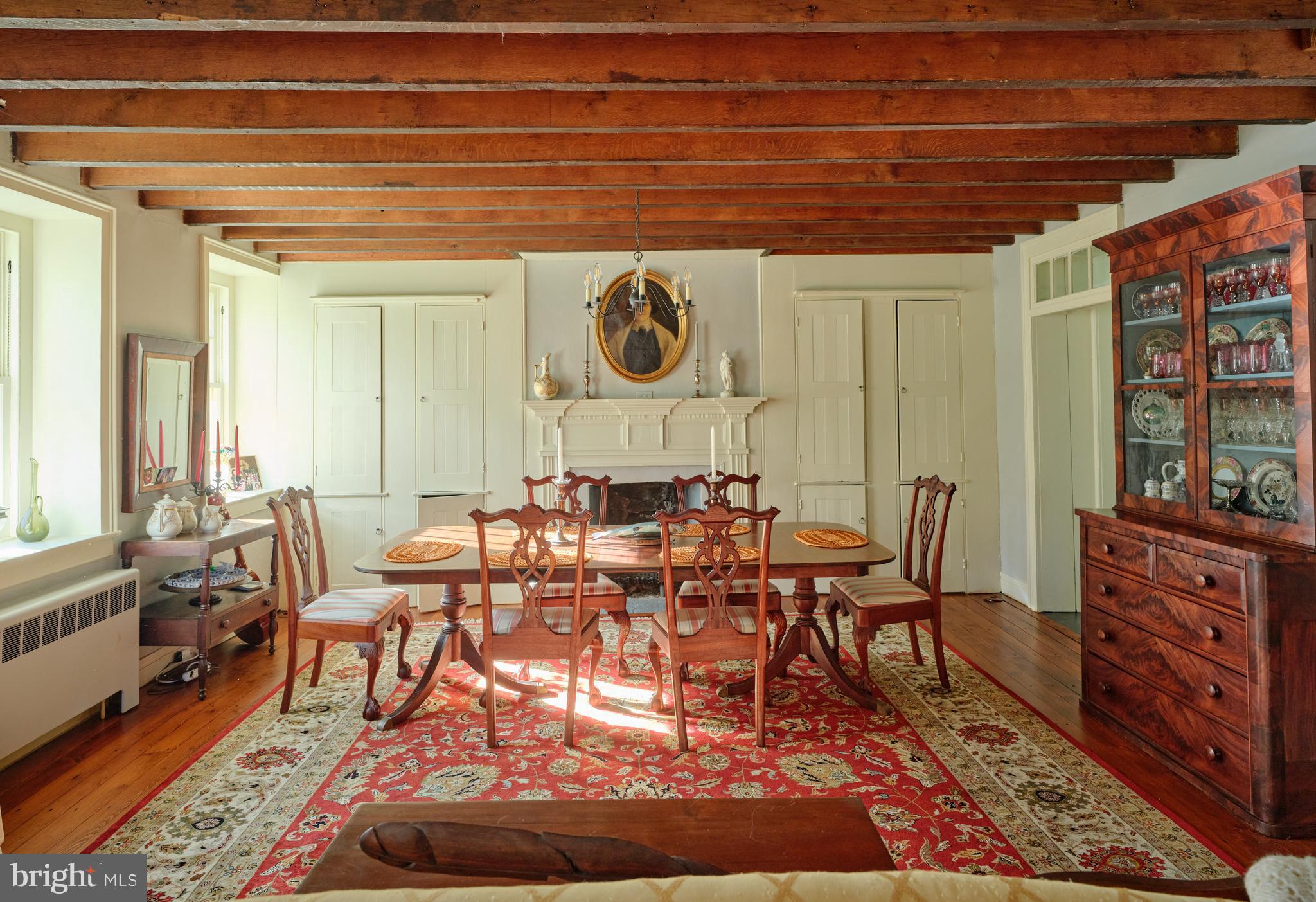 4936 Curly Hill Road Doylestown, PA 18902 - Photo 20 of 102 a dining room with furniture and wooden floor