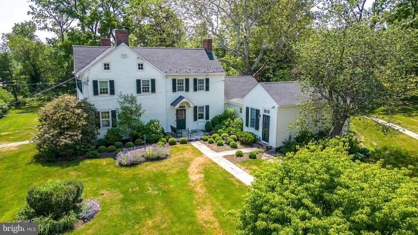 4936 Curly Hill Road Doylestown, PA 18902 - Photo 2 of 102 a aerial view of a house with swimming pool next to a yard