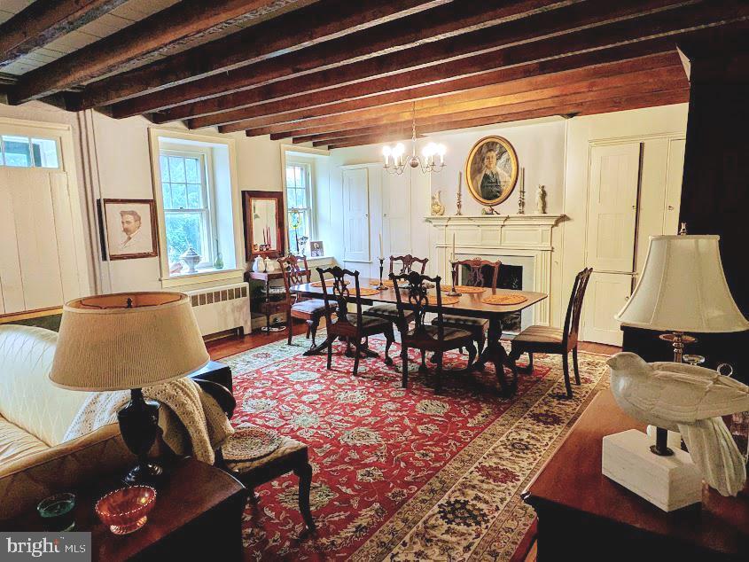 4936 Curly Hill Road Doylestown, PA 18902 - Photo 21 of 102 a living room with furniture and a large window