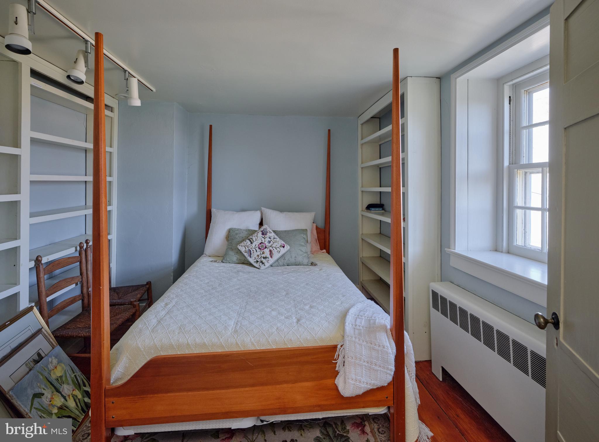 4936 Curly Hill Road Doylestown, PA 18902 - Photo 34 of 102 a bedroom with a bed and a window