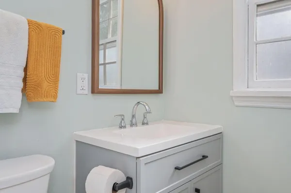 a bathroom with a sink and a toilet
