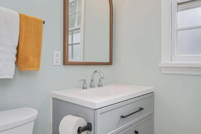 a bathroom with a sink and a toilet