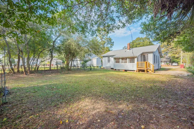 a view of house with outdoor space