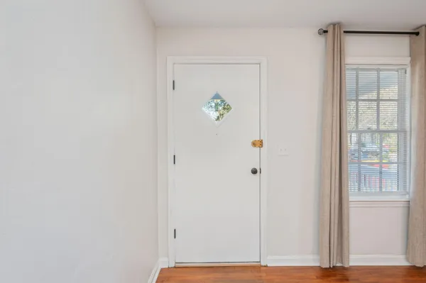 a view of kitchen with wooden floor