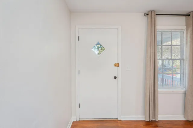 a view of kitchen with wooden floor