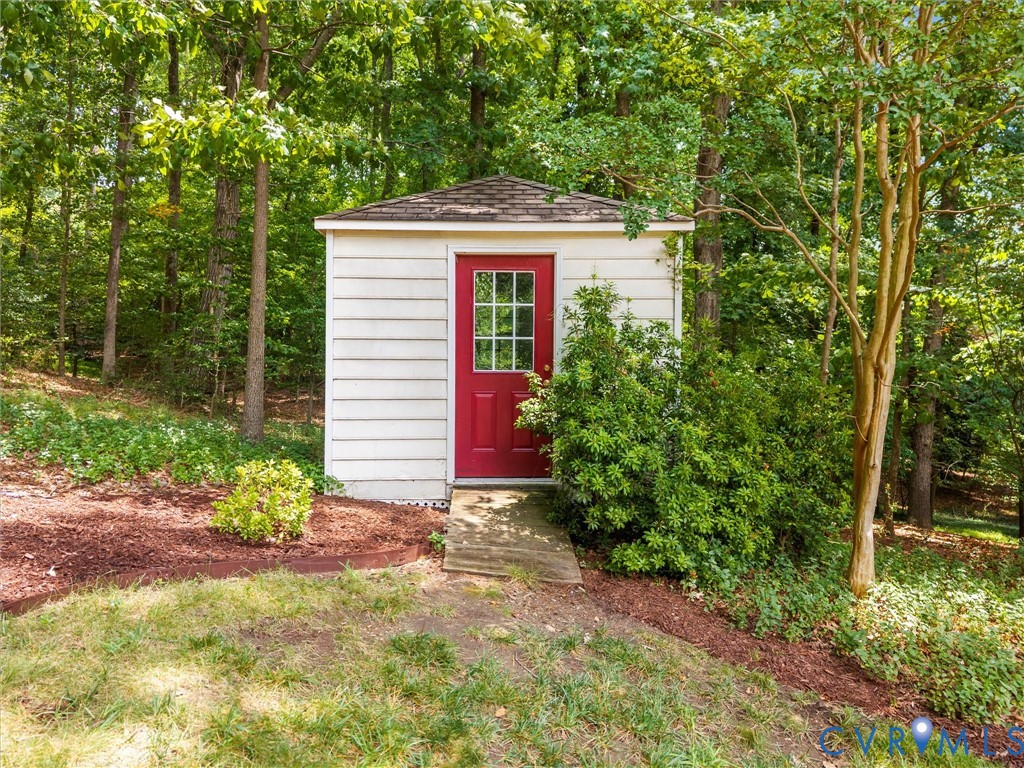 2011 Gamelaw Court Midlothian, VA 23113 - Photo 75 of 77 a front view of a house with garden