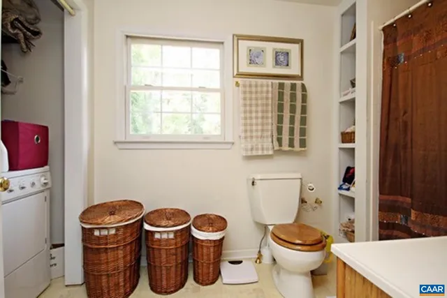 a bathroom with a toilet and a sink