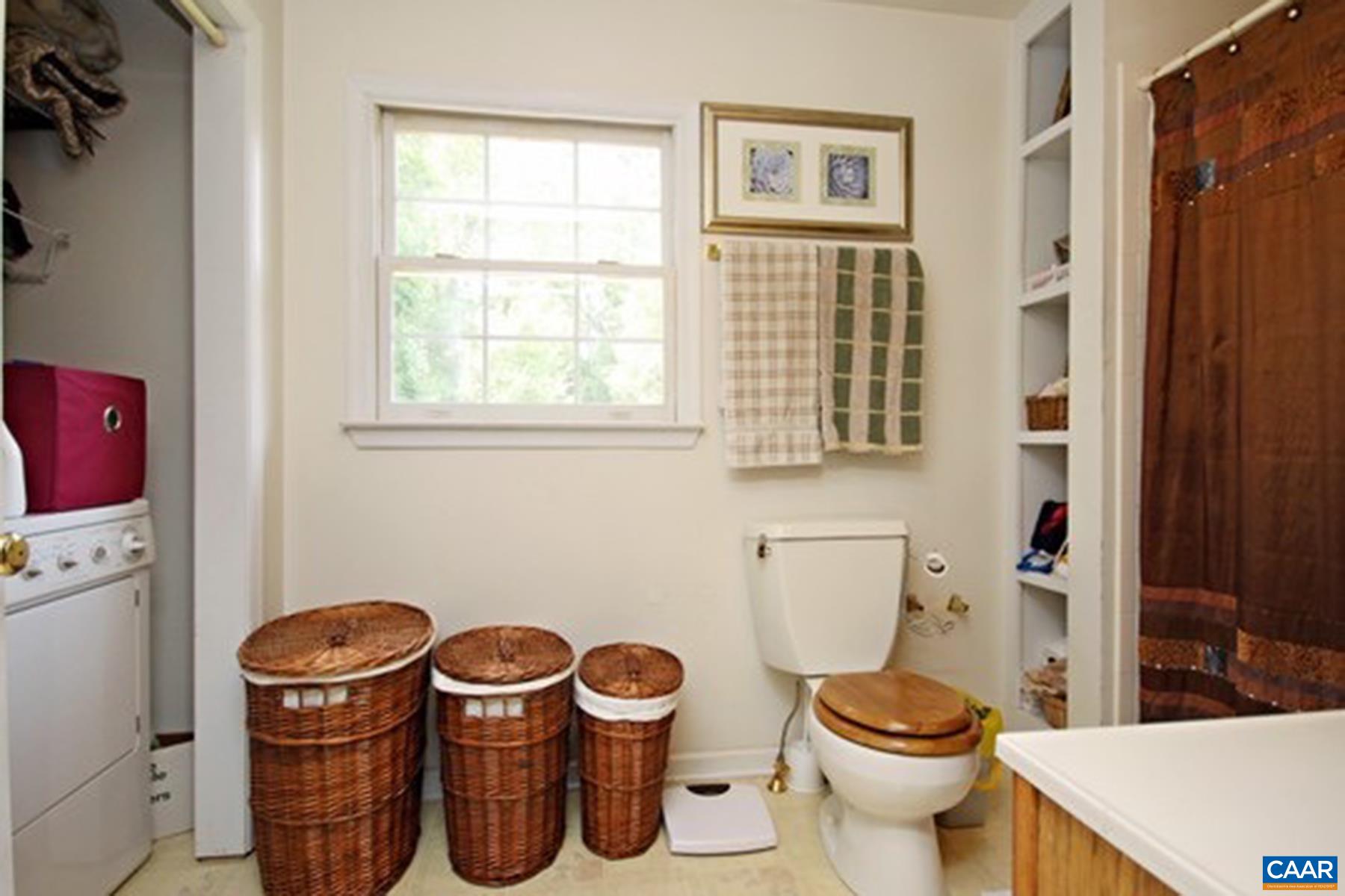 755 King Street, Unit A Charlottesville, VA 22903 - Photo 9 of 13 a bathroom with a toilet and a sink