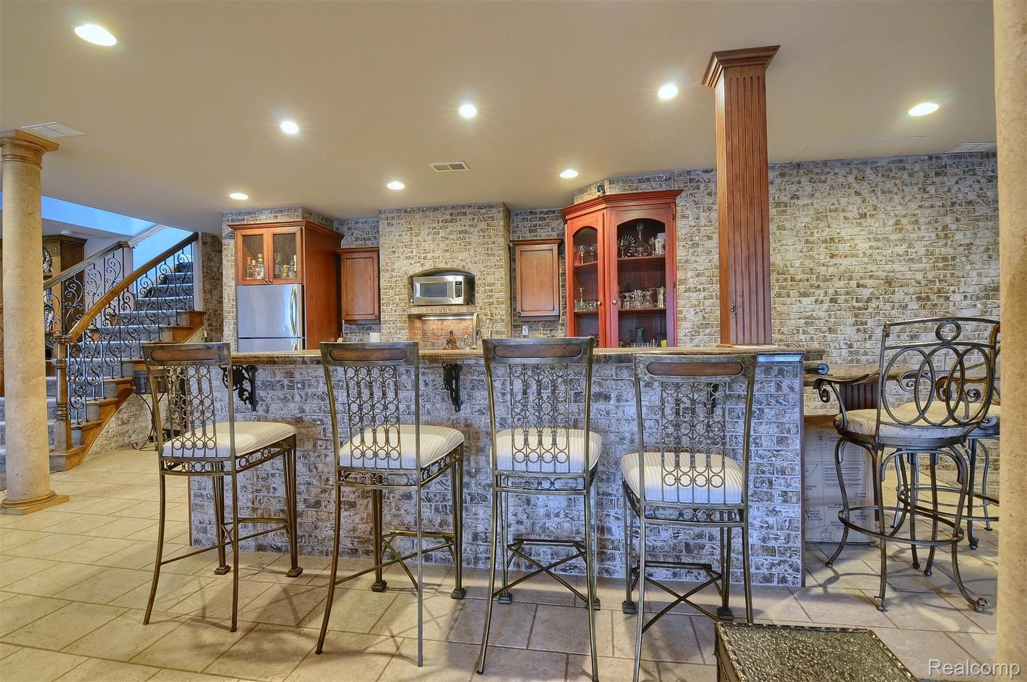 8311 Waumegah Road Clarkston, MI 48348 - Photo 43 of 61 46-Finished-Lower-Level-Bar.jpg
