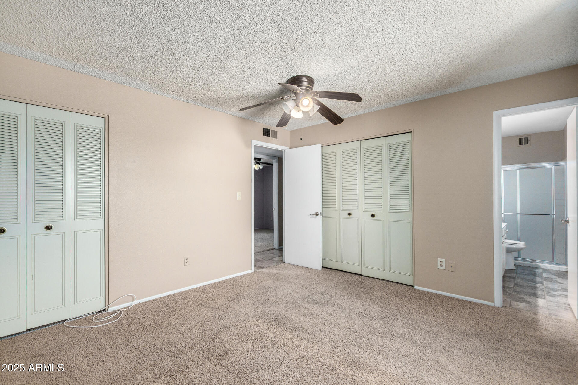 4740 West Bloomfield Road Glendale, AZ 85304 - Photo 17 of 34 a view of a livingroom with a ceiling fan and entryway
