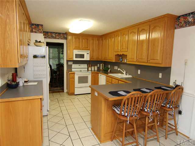 1204 Patterson Road Durham, NC 27704 - Photo 7 of 25 Ceramic tile floors, Great Counter space, all appliances remain!