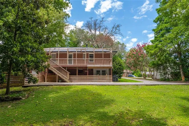a view of a tree with a yard