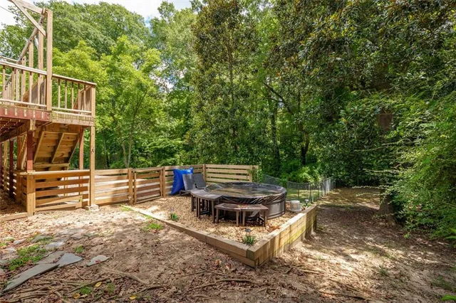 a view of a park with large trees