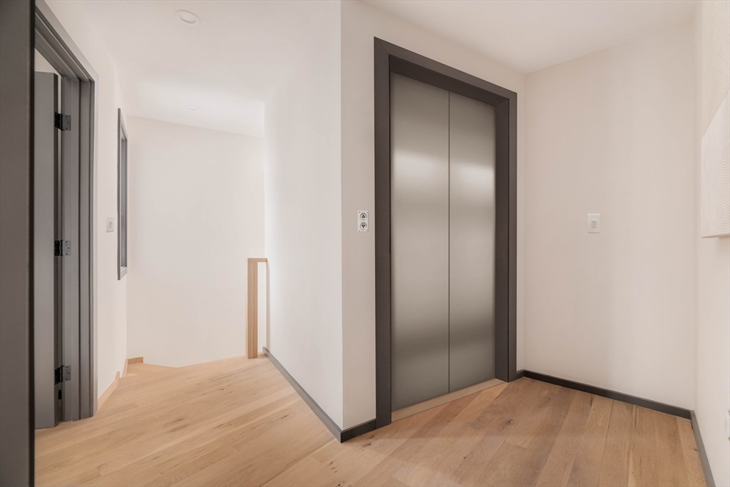 31 Highland Road, Unit 1 Brookline, MA 02445 - Photo 25 of 34 a view of an empty room