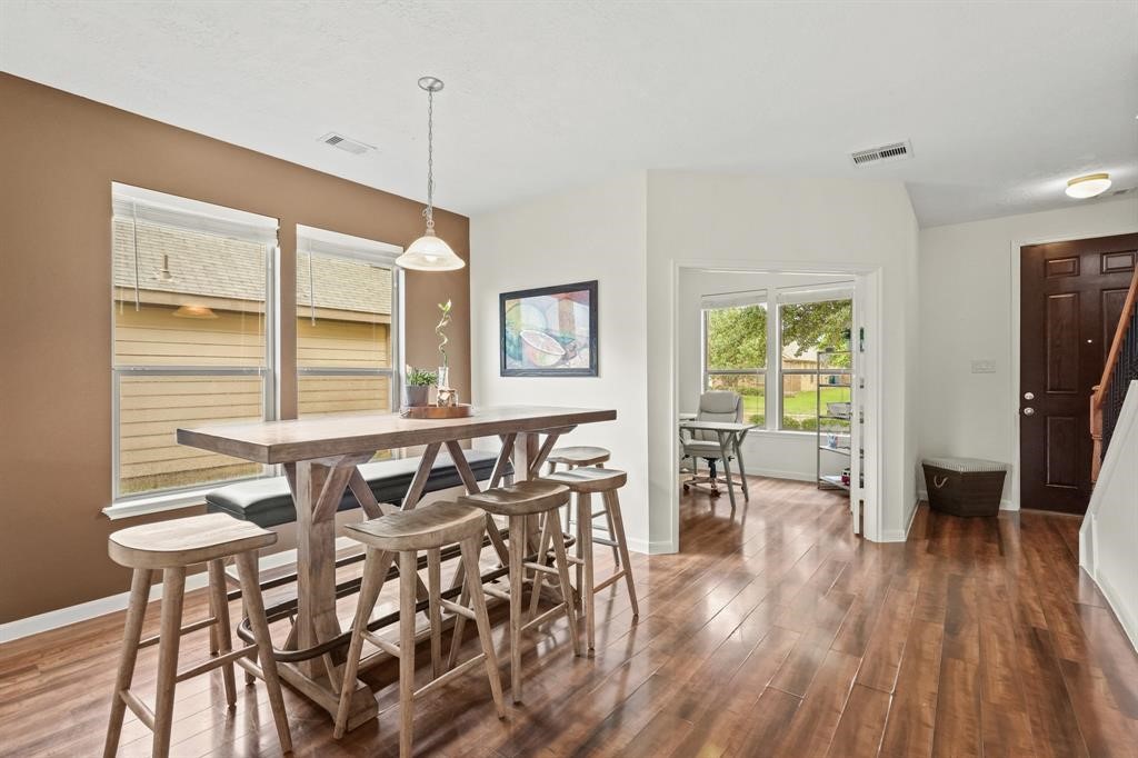 6719 Path Way Court Katy, TX 77449 - Photo 7 of 35 a dining room with furniture and wooden floor