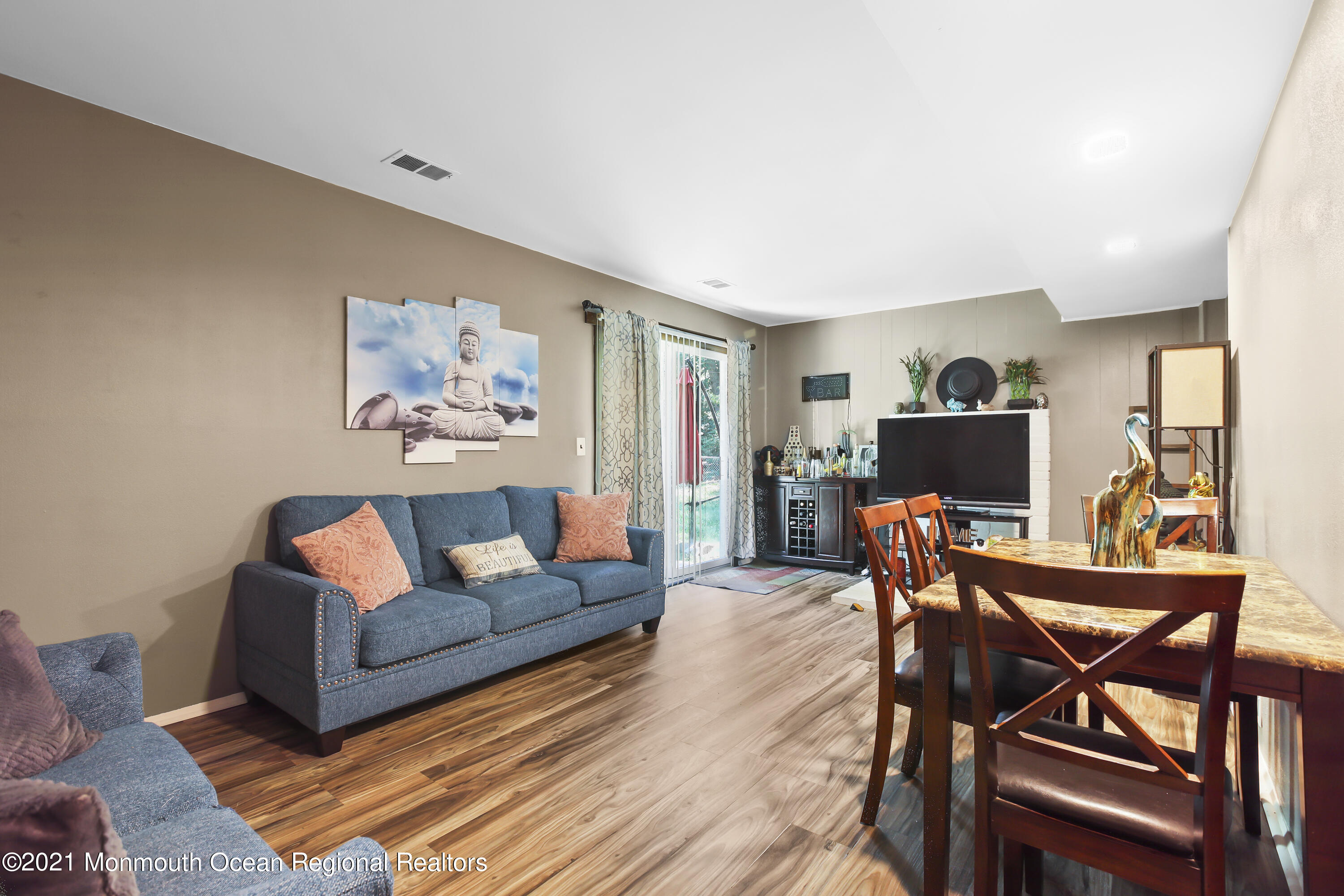 401 Cedar Swamp Road Jackson, NJ 08527 - Photo 12 of 22 a living room with furniture and a flat screen tv