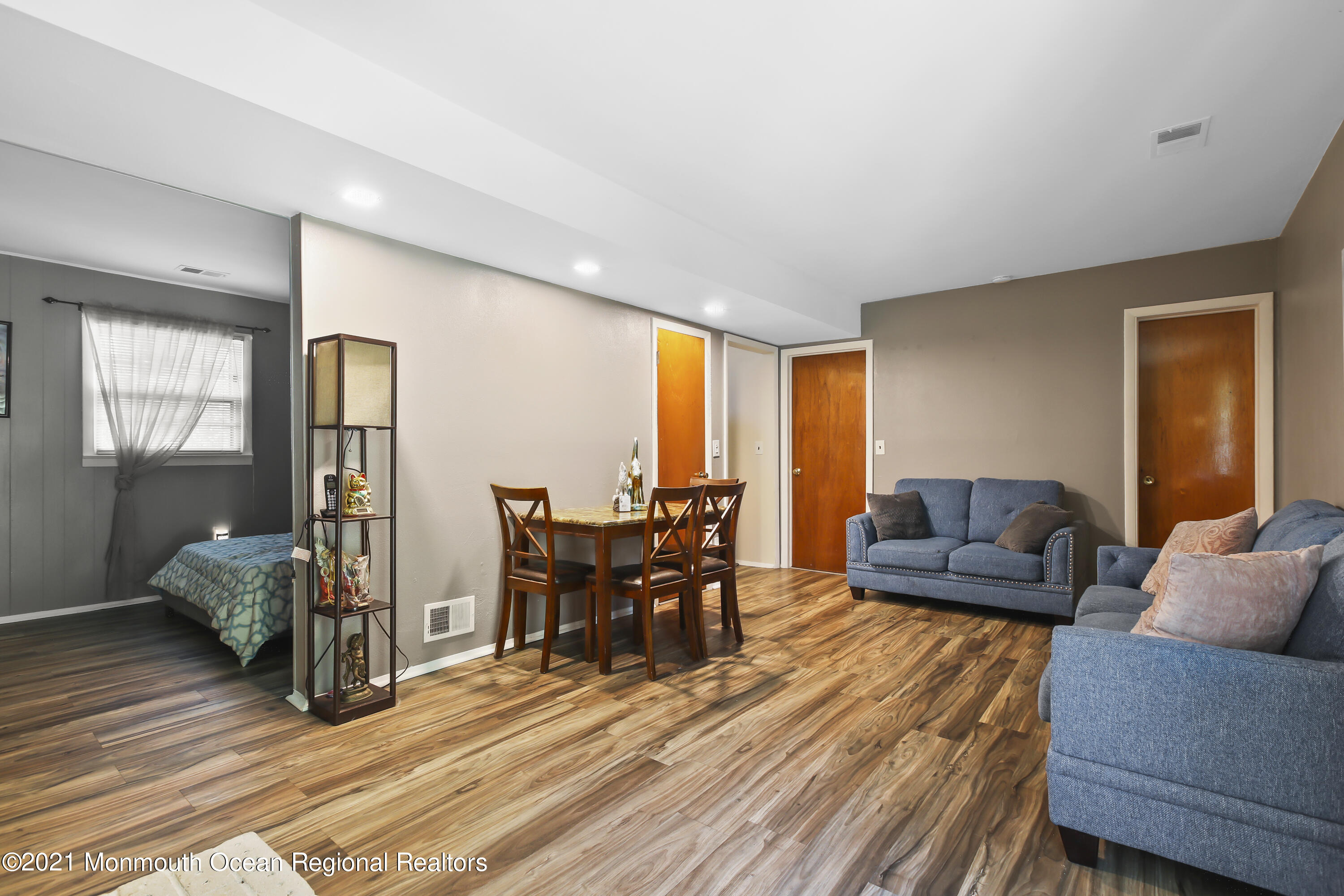 401 Cedar Swamp Road Jackson, NJ 08527 - Photo 13 of 22 a living room with furniture and wooden floor