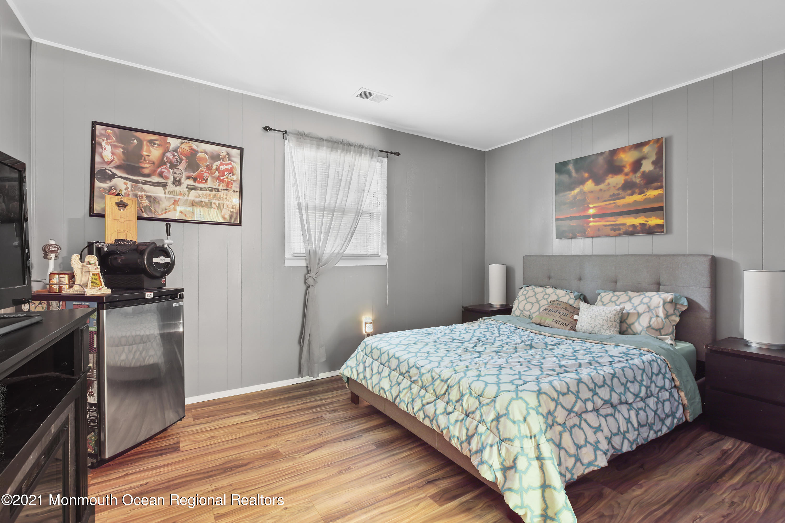 401 Cedar Swamp Road Jackson, NJ 08527 - Photo 14 of 22 a bedroom with a bed and a flat screen tv