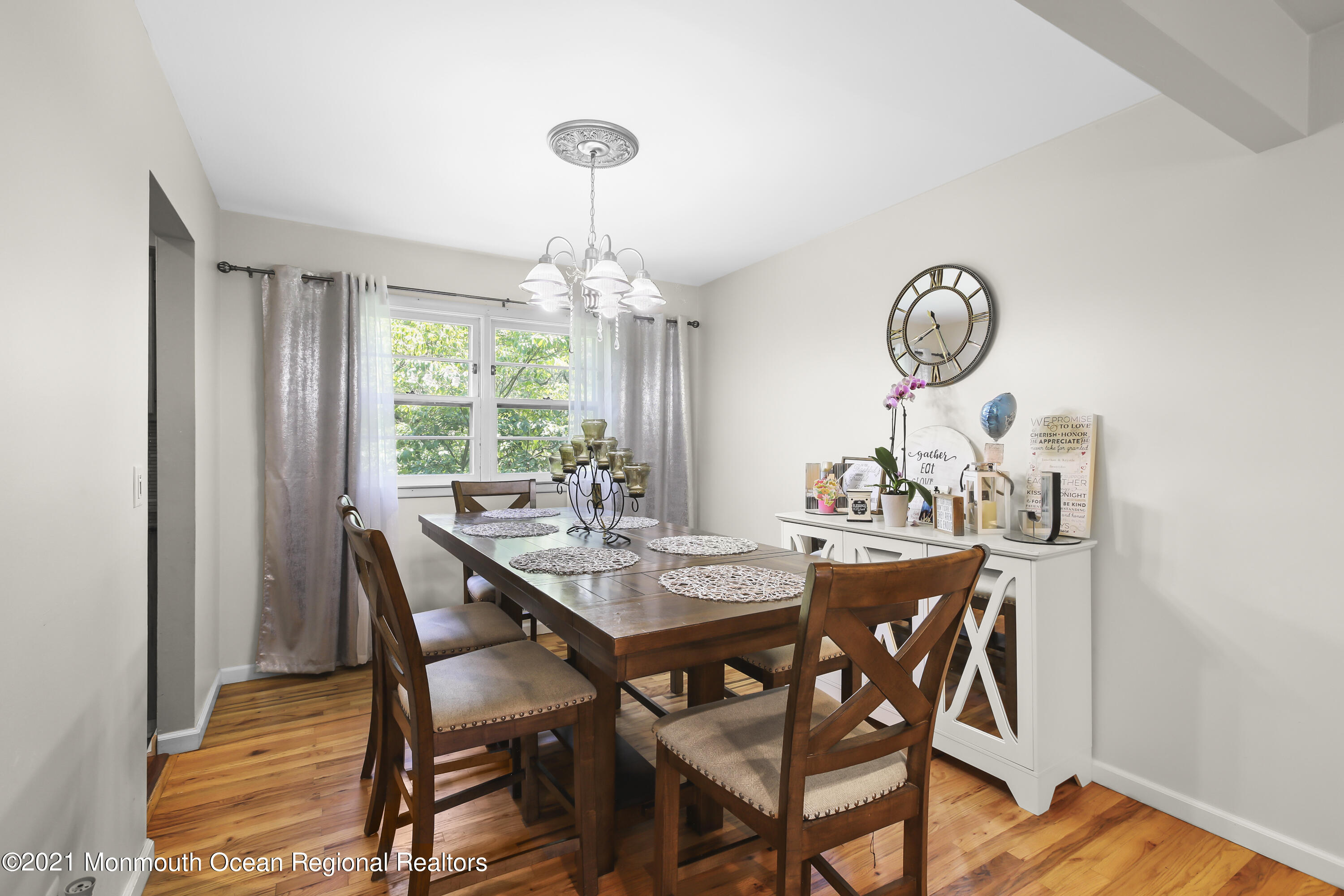 401 Cedar Swamp Road Jackson, NJ 08527 - Photo 4 of 22 a view of a dining room with furniture window and wooden floor