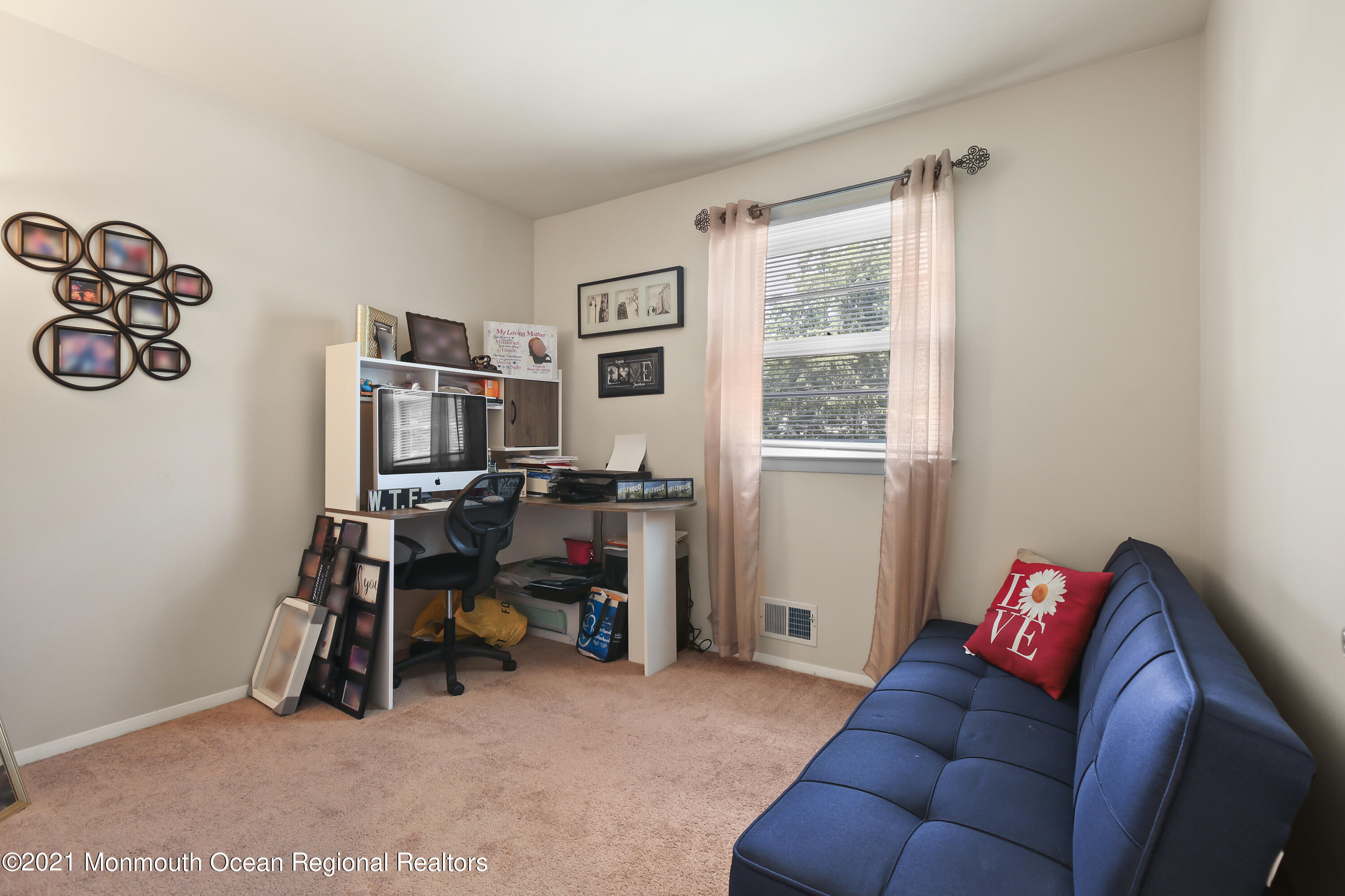 401 Cedar Swamp Road Jackson, NJ 08527 - Photo 10 of 22 a living room with furniture and a window