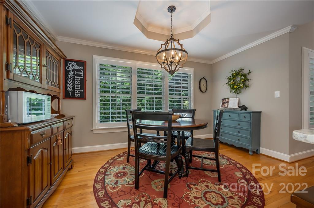 212 Ridgeview Drive Rutherfordton, NC 28139 - Photo 15 of 47 a view of a dining room with furniture window and wooden floor
