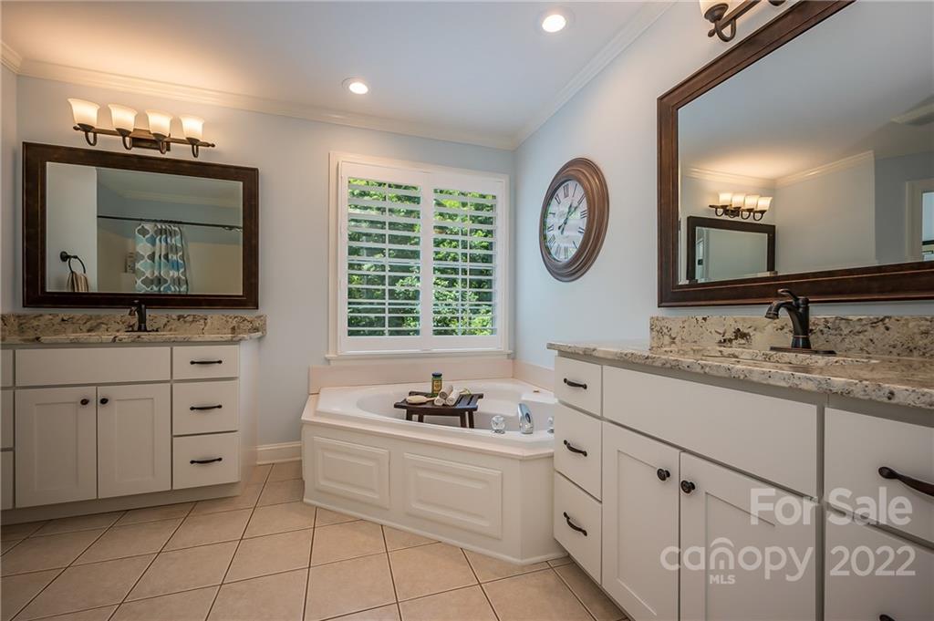 212 Ridgeview Drive Rutherfordton, NC 28139 - Photo 18 of 47 a bathroom with a sink and a large mirror