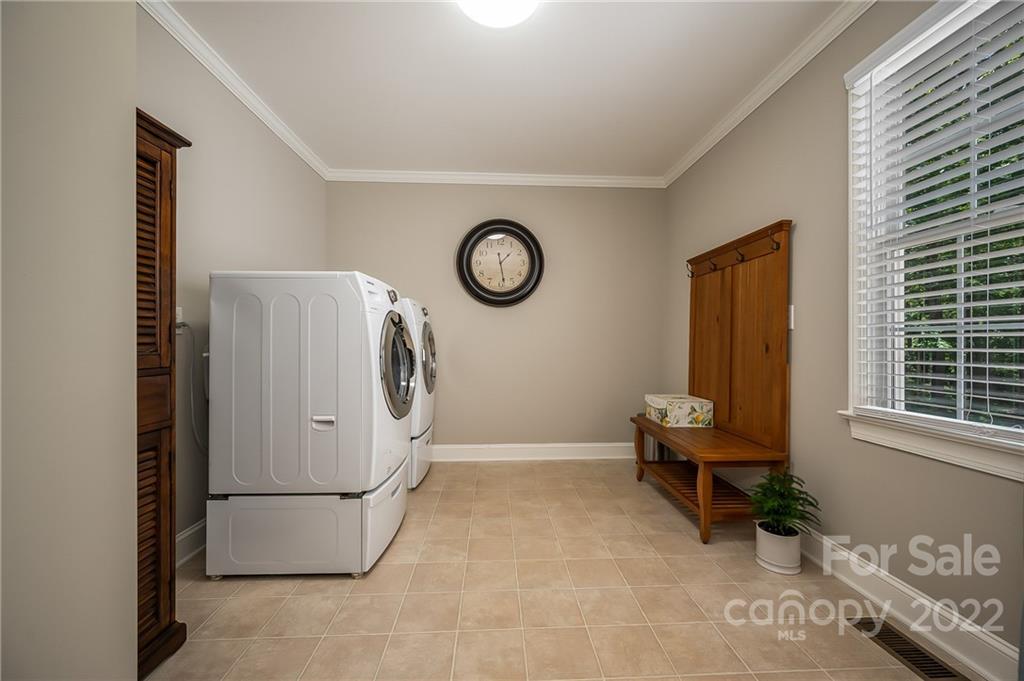 212 Ridgeview Drive Rutherfordton, NC 28139 - Photo 24 of 47 a view of a storage & utility room with washer and dryer