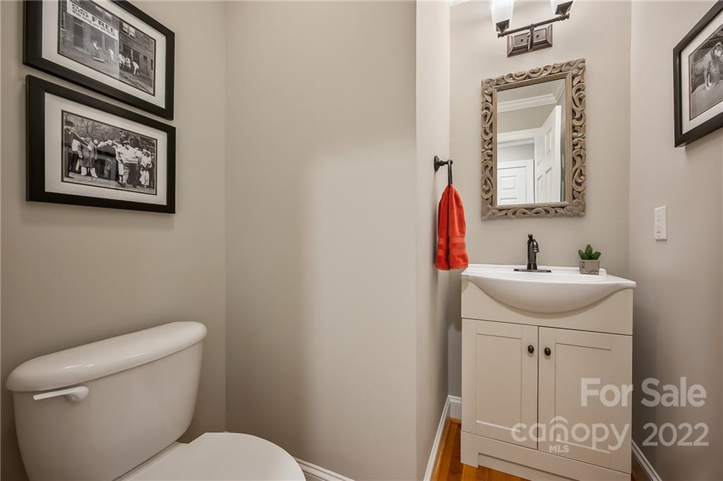 212 Ridgeview Drive Rutherfordton, NC 28139 - Photo 26 of 47 a bathroom with a toilet sink and mirror