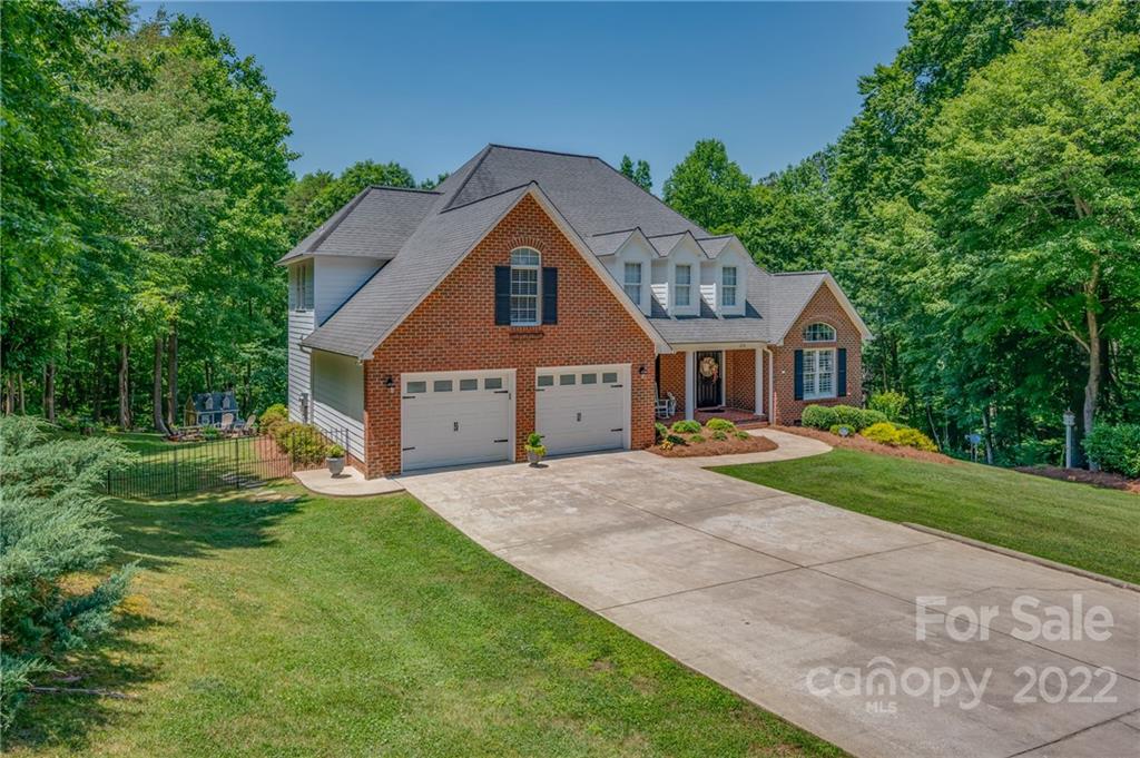 212 Ridgeview Drive Rutherfordton, NC 28139 - Photo 3 of 47 a front view of a house with a yard and garage