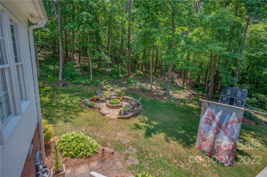 212 Ridgeview Drive Rutherfordton, NC 28139 - Photo 38 of 47 a view of a backyard with plants and garden