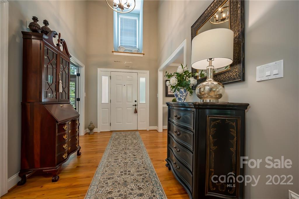 212 Ridgeview Drive Rutherfordton, NC 28139 - Photo 4 of 47 a hallway with a stove and a mirror
