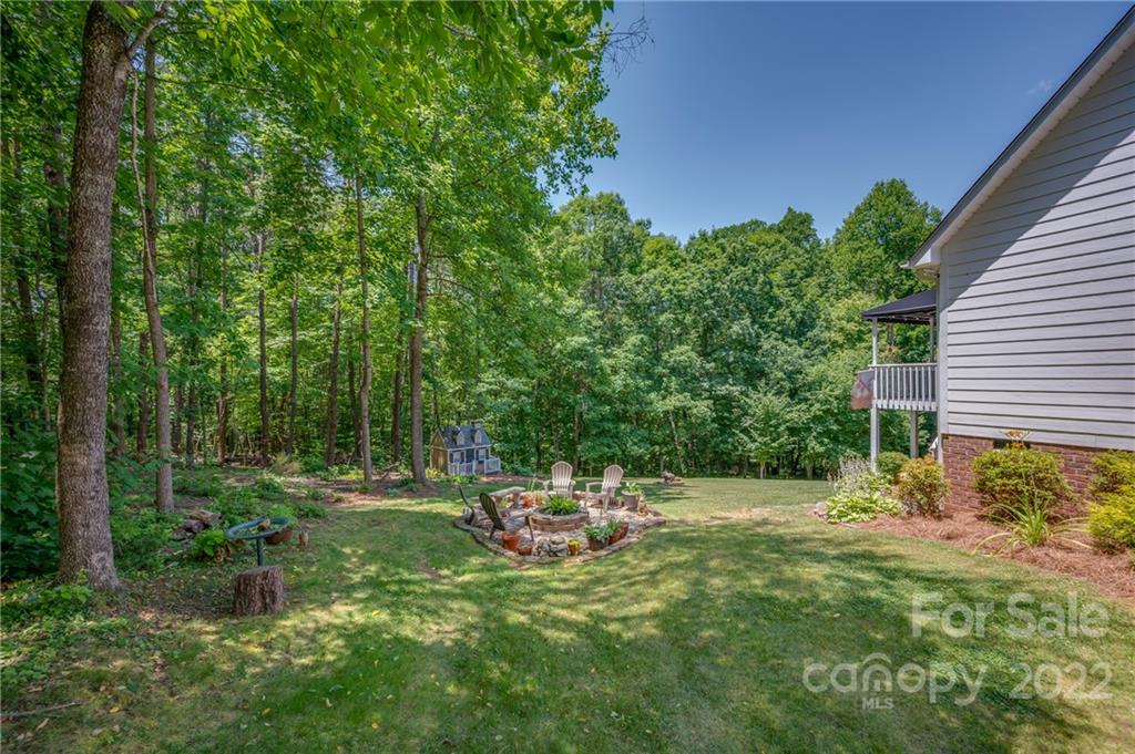 212 Ridgeview Drive Rutherfordton, NC 28139 - Photo 42 of 47 a backyard of a house with lots of green space