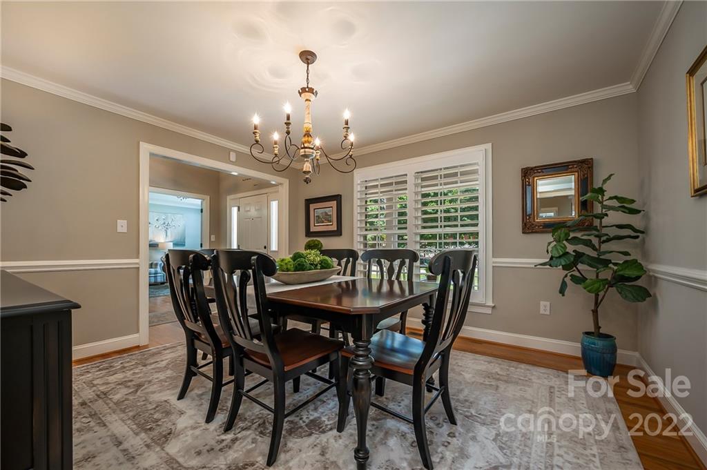 212 Ridgeview Drive Rutherfordton, NC 28139 - Photo 6 of 47 a dining room with furniture potted plants and wooden floor