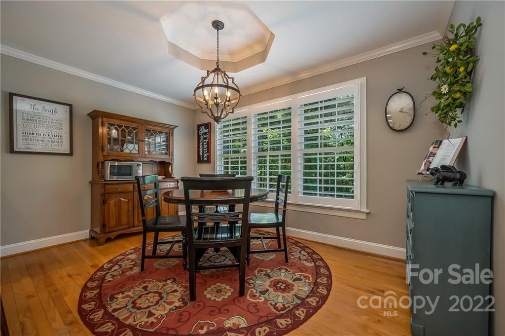 212 Ridgeview Drive Rutherfordton, NC 28139 - Photo 7 of 47 a view of a dining room with furniture window and wooden floor
