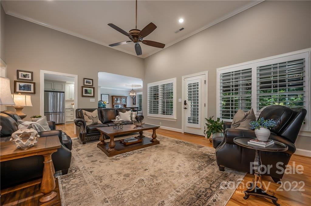 212 Ridgeview Drive Rutherfordton, NC 28139 - Photo 9 of 47 a living room with furniture ceiling fan and a large window