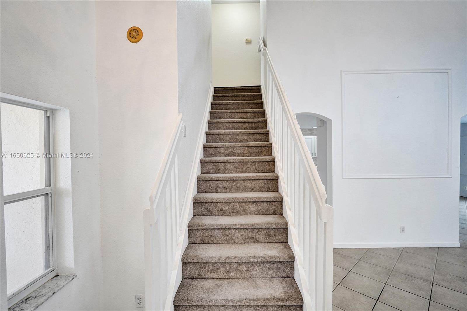 6073 Spring Isles Boulevard Lake Worth, FL 33463 - Photo 24 of 66 a view of entryway