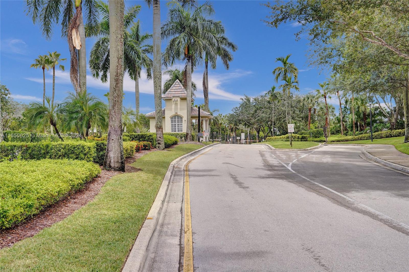 6073 Spring Isles Boulevard Lake Worth, FL 33463 - Photo 52 of 66 a view of a park that has a lots of plants and trees