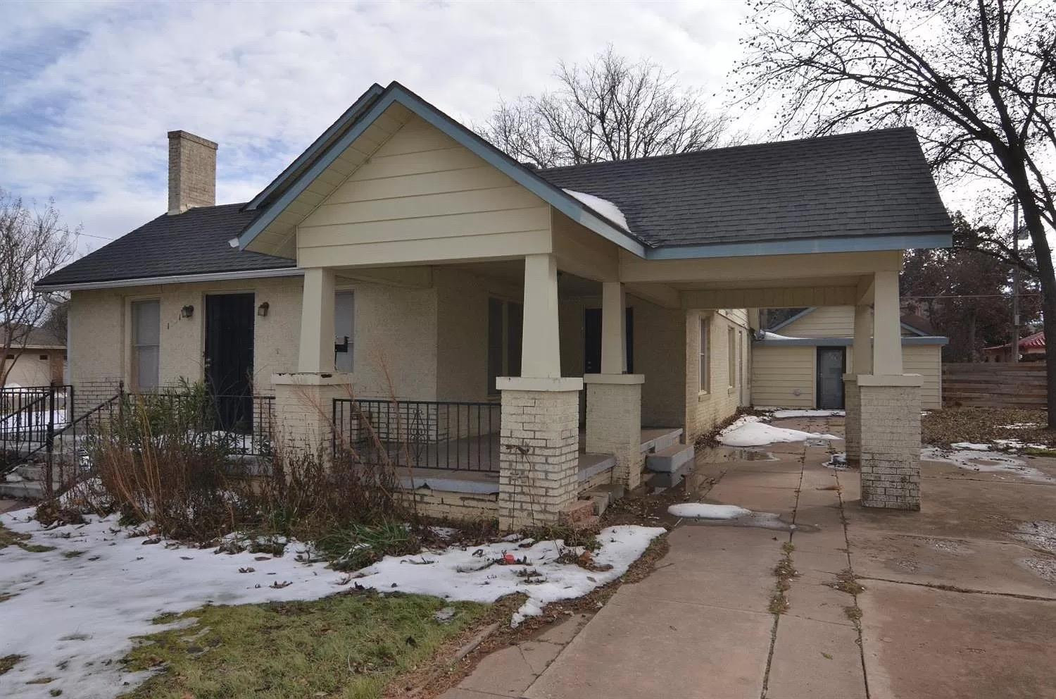 1901 28th Street Lubbock, TX 79411 - Photo 1 of 17 a front view of a house with a yard